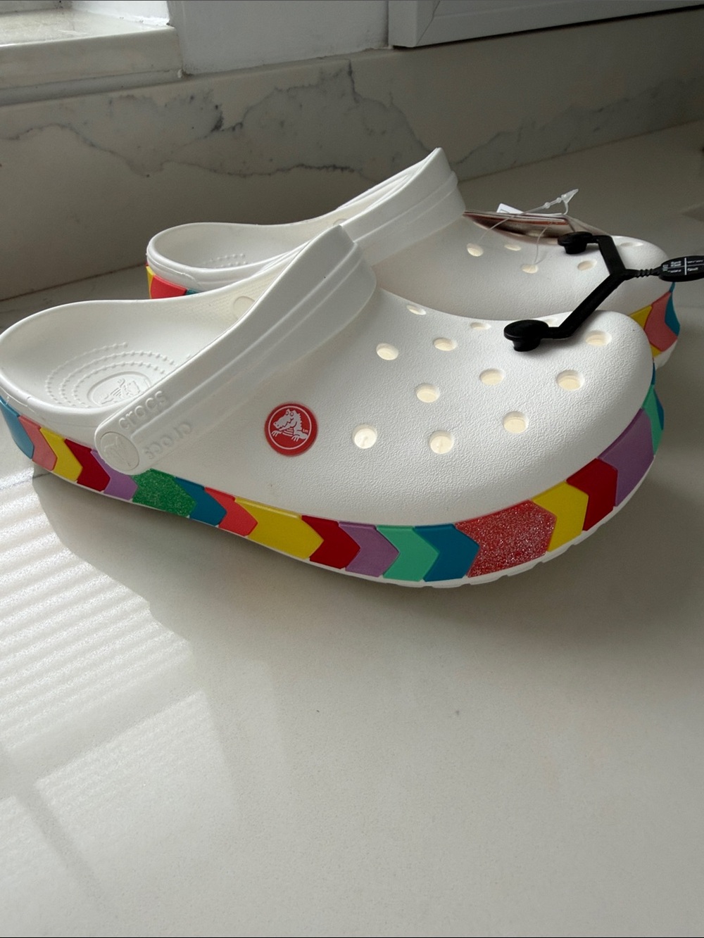 CROCS Kids White Clog with Rainbow Chevron Strap